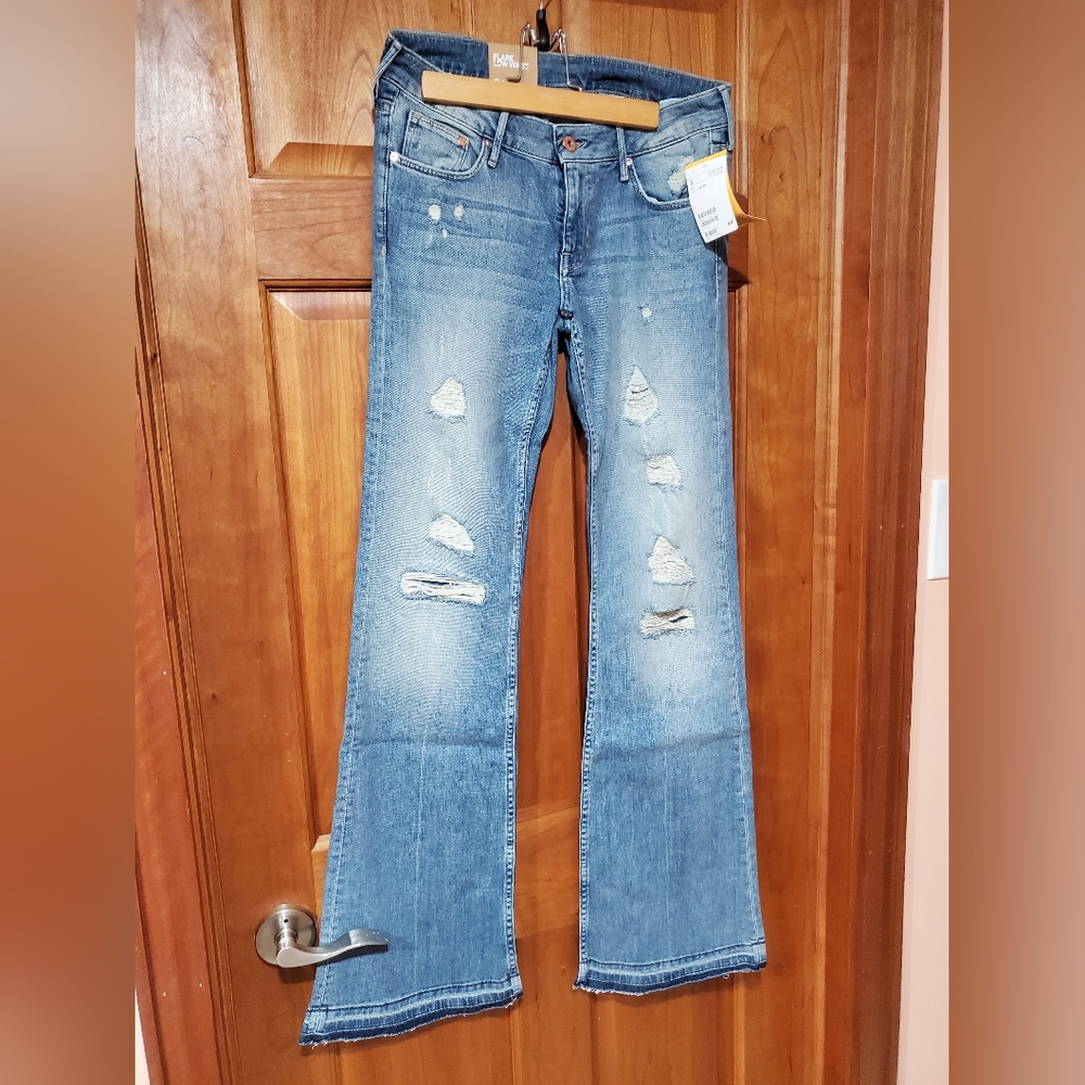New H&M women's flare cut low waist jeans European size 28/30